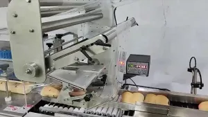 Ensacheuse horizontale flowpack à alimentation par bobine supérieur