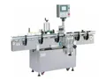 Étiqueteuse automatique pour bouteilles rondes