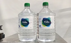Étiqueteuse automatique pour bouteilles rondes