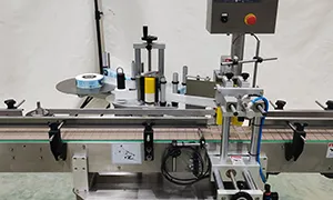 Étiqueteuse automatique pour bouteilles rondes