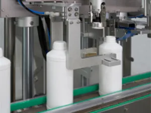 Remplisseuse-boucheuse automatique servo-commandée