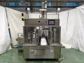 Ensacheuse rotative pour sachets préformés en poudre