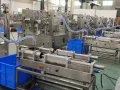 Ensacheuse rotative pour sachets préformés pour liquides et pâtes