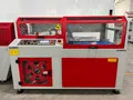Machine automatique de suremballage rétractable avec soudeuse latérale